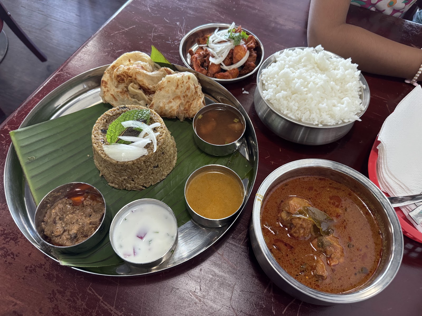 A spread of South Indian curries and breads